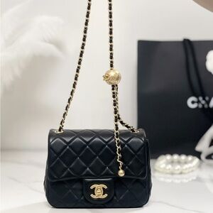 Chanel Black Quilted Mini Bag with Gold Accents